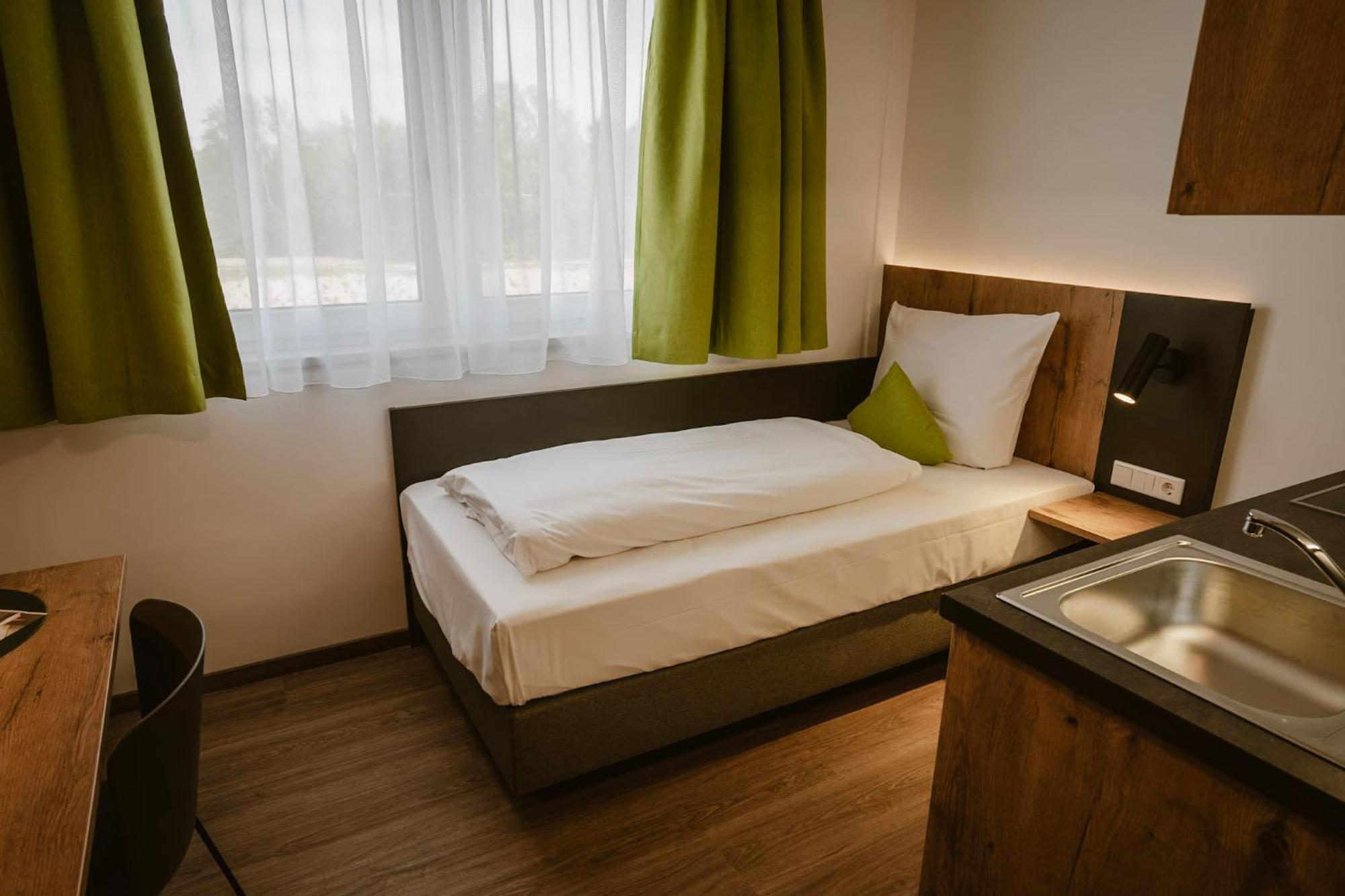 Motel Sleep Inn Toging am Inn Екстер'єр фото