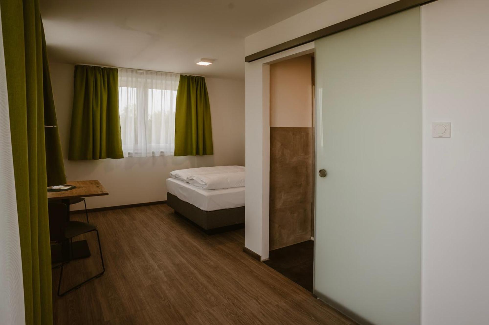 Motel Sleep Inn Toging am Inn Екстер'єр фото
